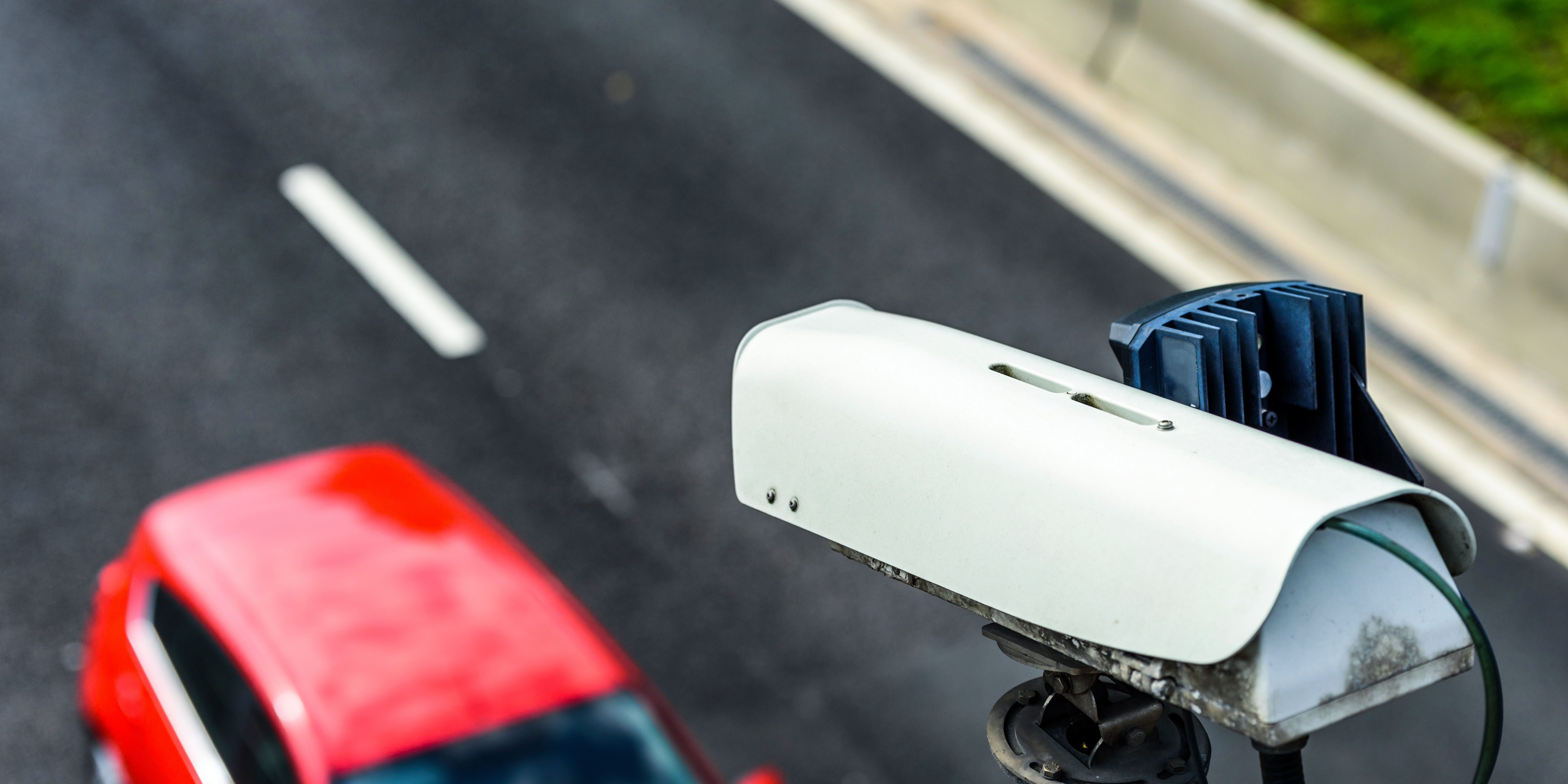 Speed camera monitoring traffic on UK Motorway
