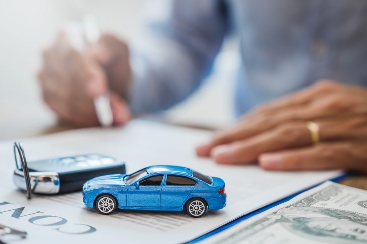 Sale agent  deal to agreement successful car loan contract with